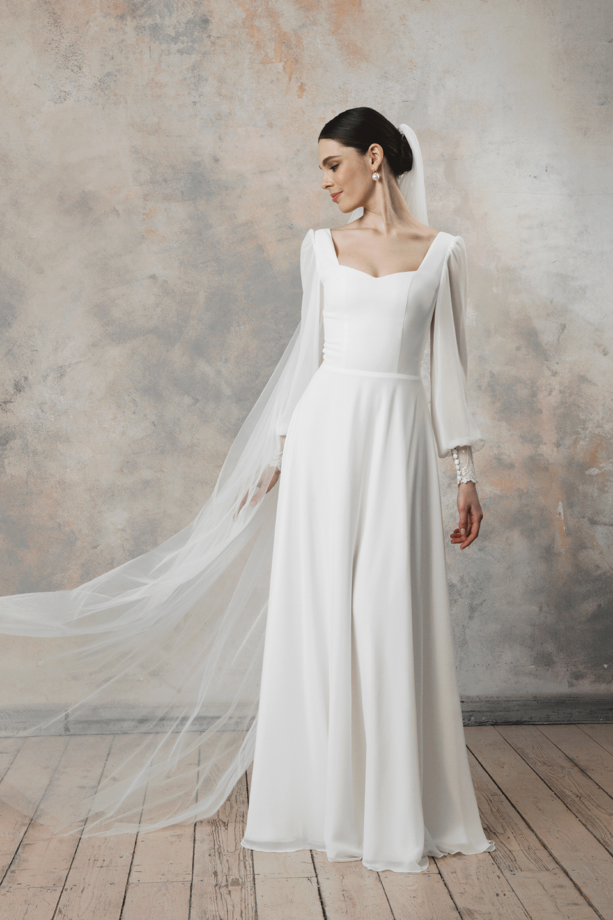 Simple and elegant wedding dress with long sleeves