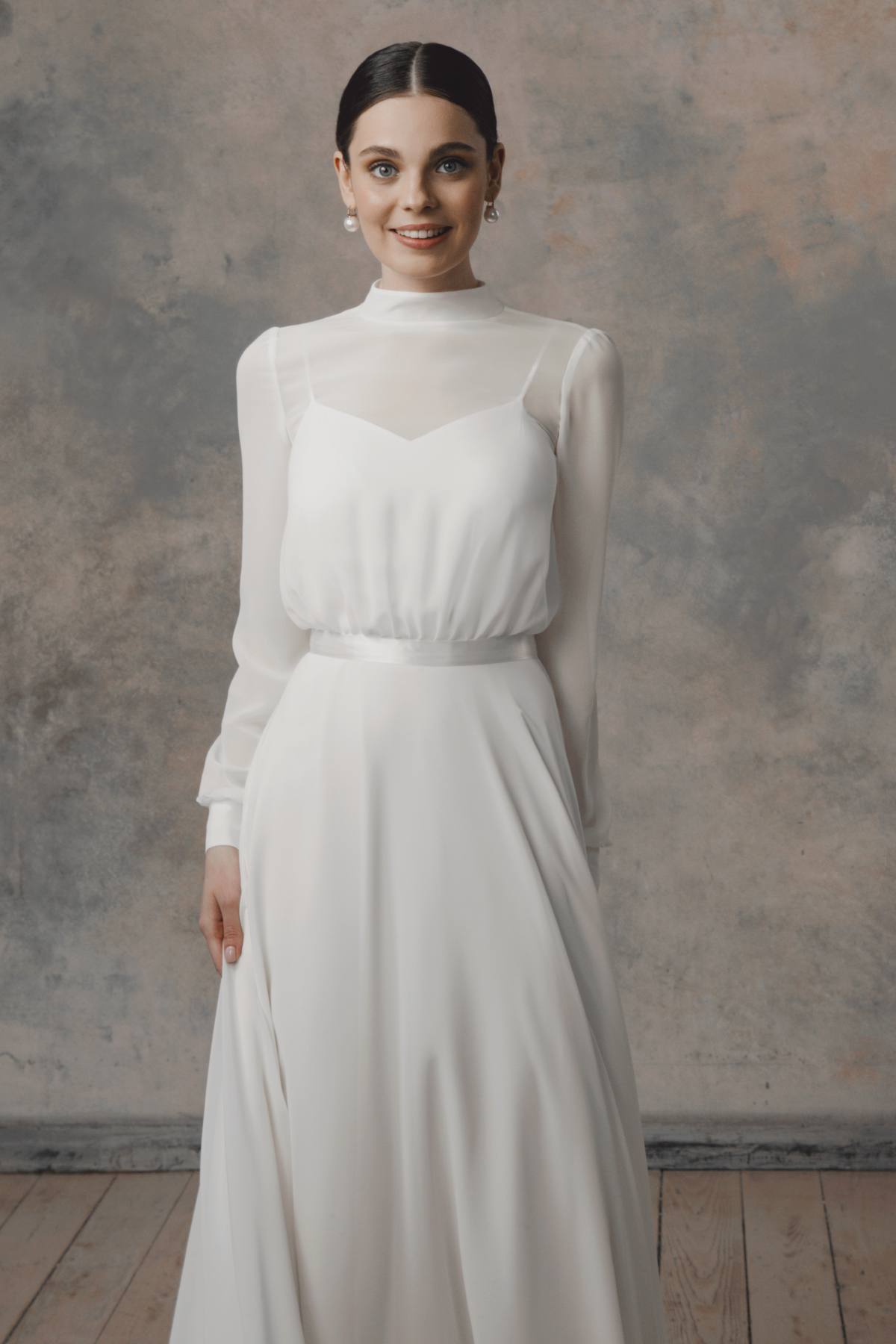 Modest wedding dress with long sleeves.