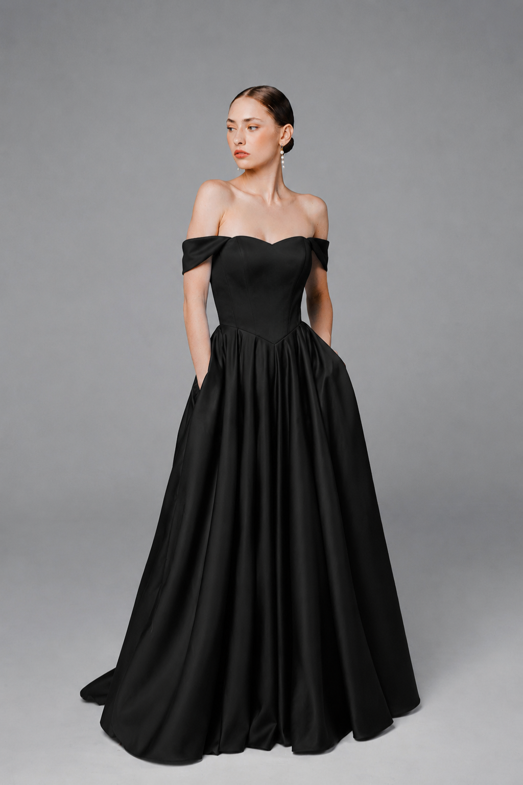 Black satin A-line wedding dress with basque waist and full skirt