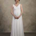 Maternity gown with a V-neckline and an A-line chiffon skirt, front view.