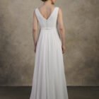 Full back view of a maternity chiffon gown with a V-back and flowing A-line skirt.
