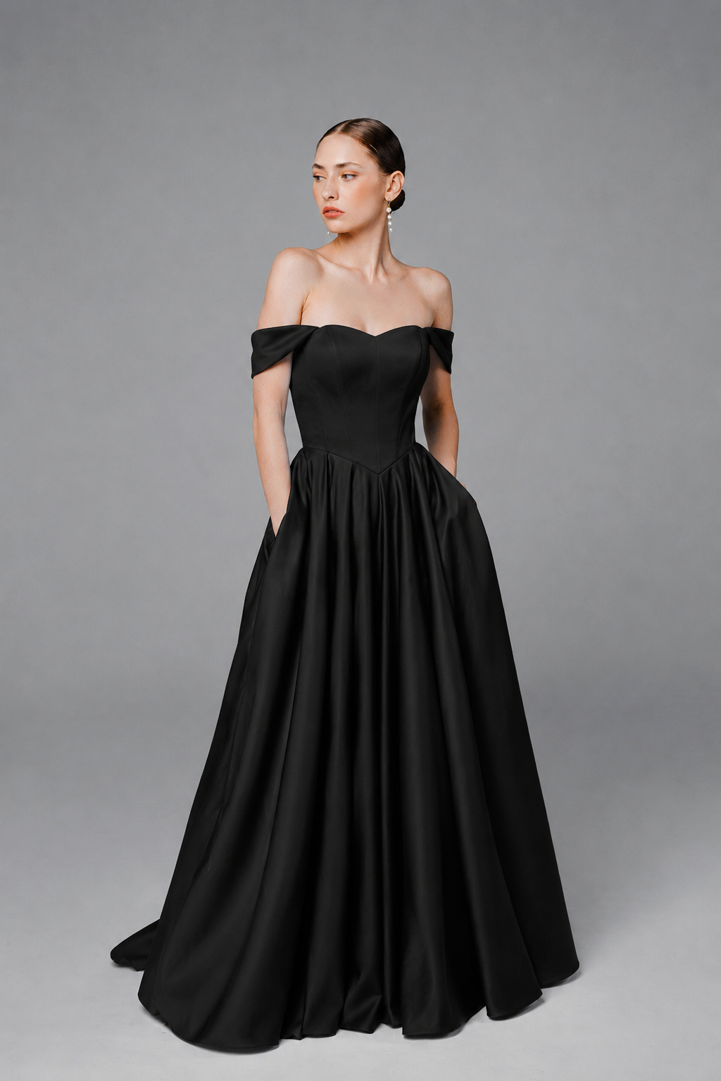 Black satin A-line wedding dress with basque waist and full skirt